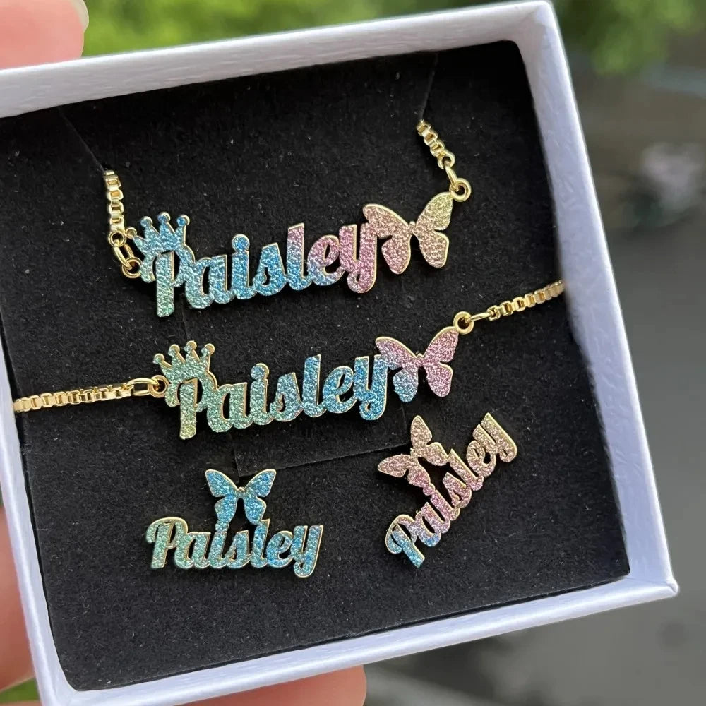 Hot Trend Vault personalized kids jewelry set including name necklace, bracelet, and earrings made of stainless steel.