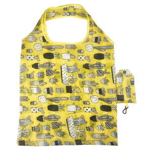 Foldable eco-friendly reusable grocery tote bag by Hot Trend Vault, showing its compact design and durable material.