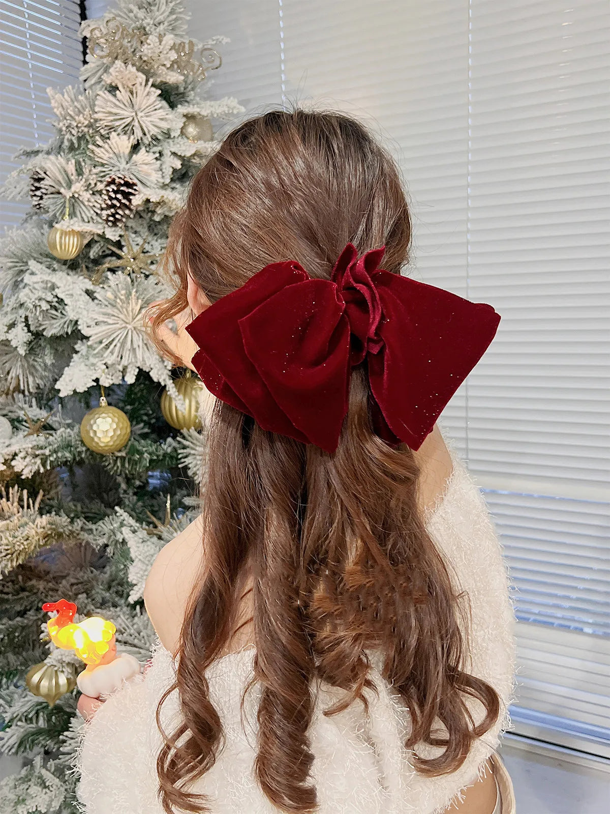 Velvet oversize bow hair clip for women and girls, stylish accessory from Hot Trend Vault, shown in black with a large bow design.