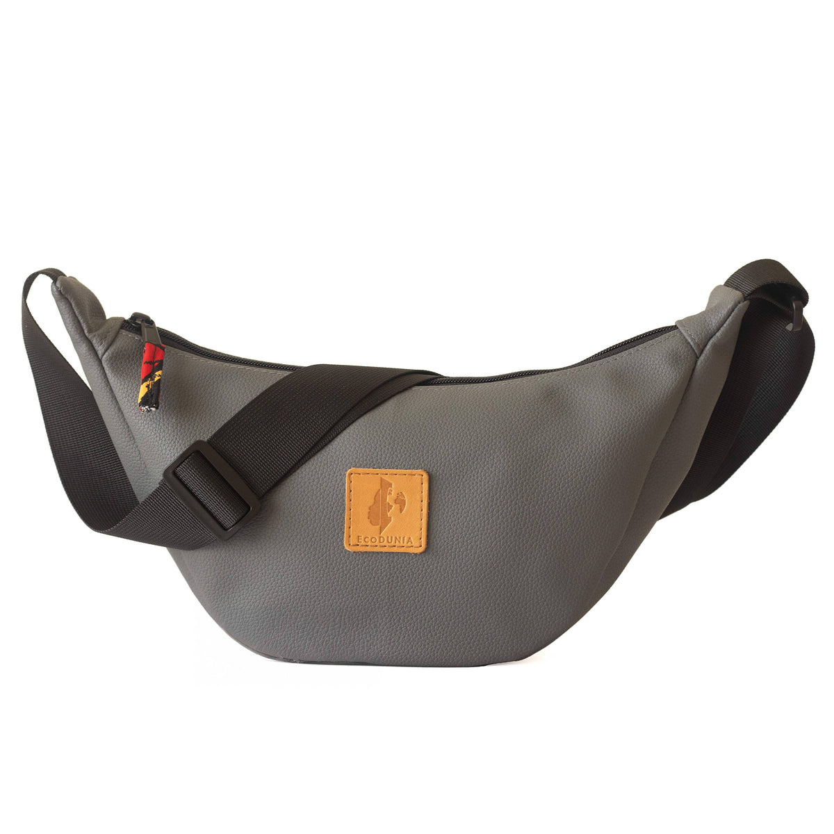 Gray round mini vegan leather shoulder bag with Kenyan fabric lining by Ecodunia, featuring a compact design and adjustable strap.