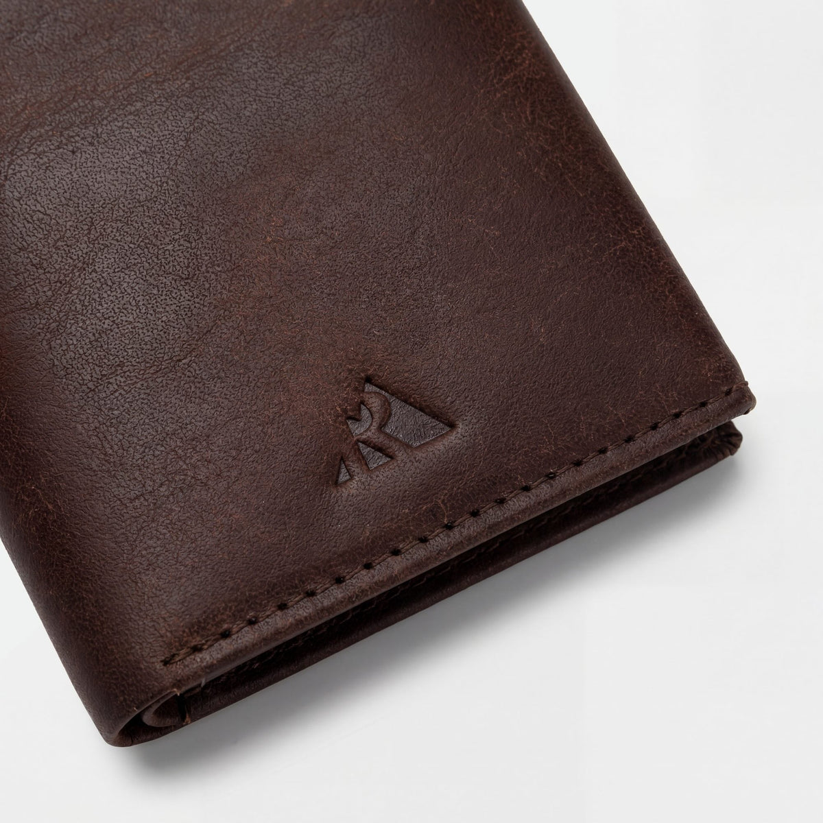 Full-grain vegetable tanned leather wallet with RFID blocking and popup card feature by Hot Trend Vault.