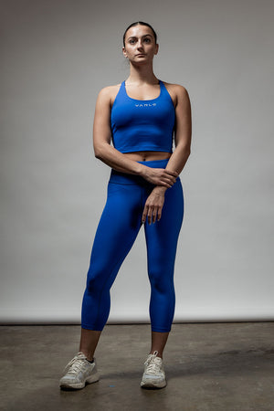 Women’s Soho 3/4 leggings in Neo Blue by Hot Trend Vault, featuring a comfortable, stretchy fit for studio or casual wear.