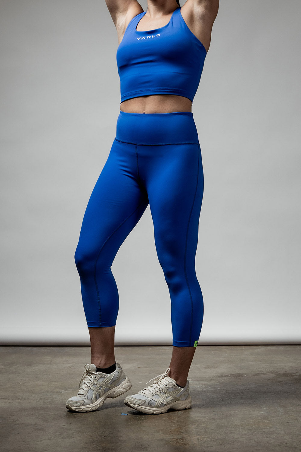 Women’s Soho 3/4 leggings in Neo Blue by Hot Trend Vault, featuring a comfortable fit and studio-ready design.