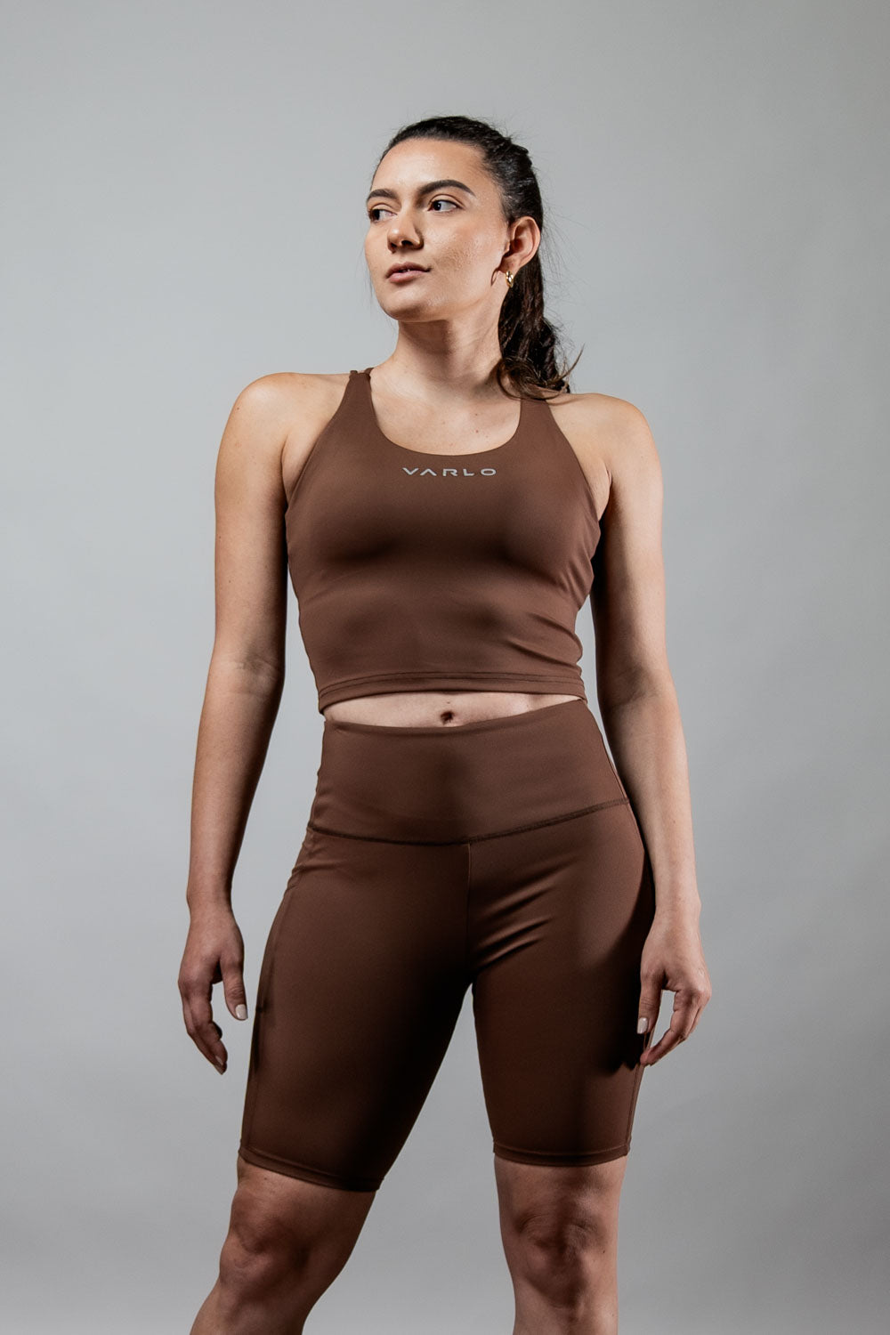 Women’s Soho cross back crop tank top by Hot Trend Vault in City Mocha, featuring built-in support and stylish cross-back design.