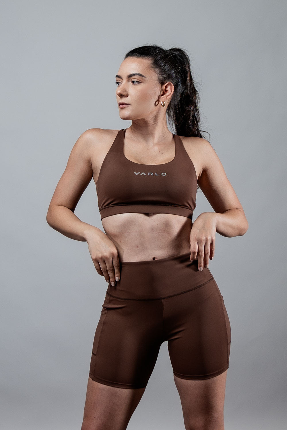 Women’s City Mocha breathable sports bra with cross back design by Hot Trend Vault, offering supportive activewear for women.