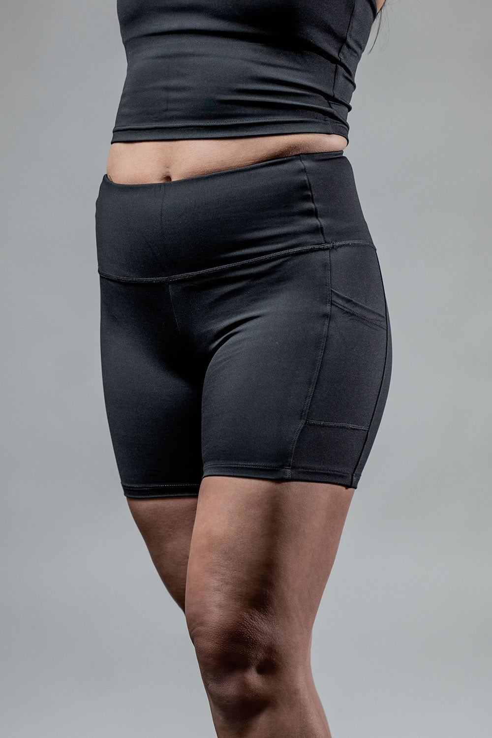 Women’s Soho 5-inch inseam fitness shorts by Hot Trend Vault, black breathable performance shorts for active wear.