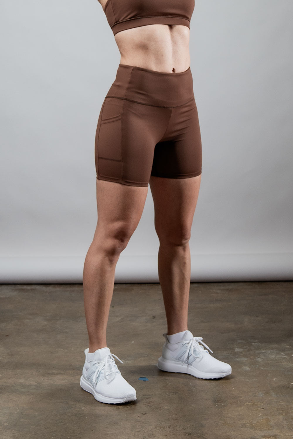 Women’s SOHO 5-inch inseam fitness shorts by Hot Trend Vault in city mocha, shown on a woman, ideal for active wear.
