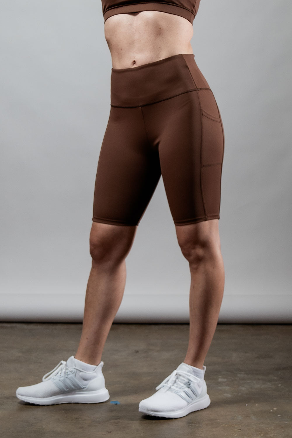 Women’s SOHO Fitness Shorts in city mocha color, 8-inch inseam, from Hot Trend Vault, designed for activewear and workout comfort.