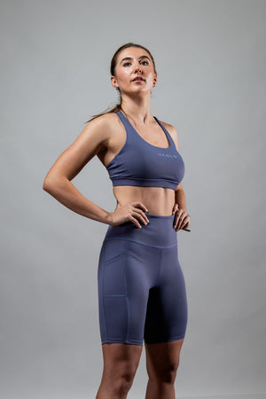 Women’s SOHO Fitness Shorts in Lilac Mist by Hot Trend Vault, 8-inch length, showcasing comfortable athletic shorts for women.