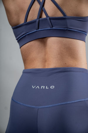 Women wearing Lilac Mist SOHO Fitness Shorts by Hot Trend Vault, 8-inch length, showcasing a comfortable fit for active wear.