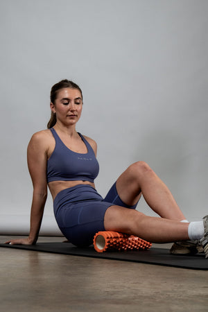 Women wearing Hot Trend Vault SOHO Fitness Shorts in Lilac Mist, 8-inch length, designed for all-day comfort.