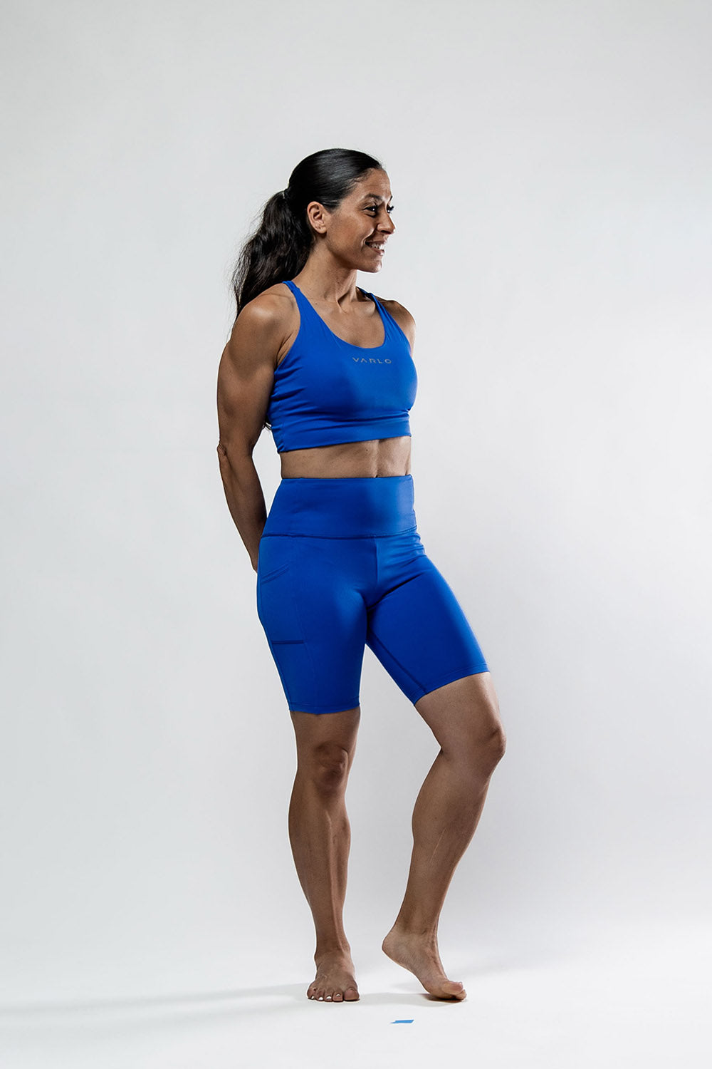 Women’s SOHO Fitness Shorts 8 Inch Neo Blue by Hot Trend Vault, featuring a comfortable fit and stylish design for active wear.