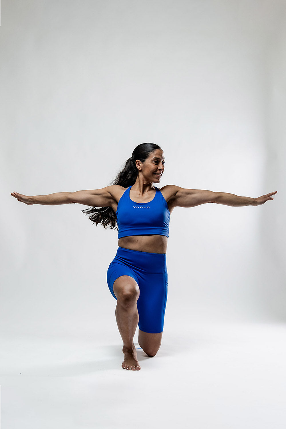 Women’s SOHO Fitness Shorts in Neo Blue by Hot Trend Vault, 8-inch length, designed for all-day comfort.