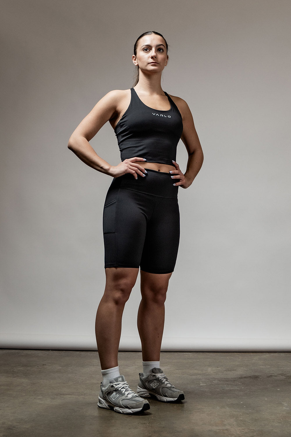 Black SOHO women's cross back crop tank top by Hot Trend Vault, sleek design with supportive fit and stylish cross-back detail.