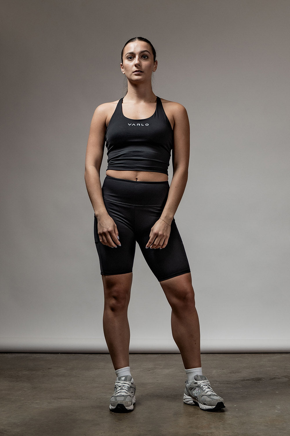 Black SOHO women's cross-back crop tank top with sleek design, support, and trendy style by Hot Trend Vault.