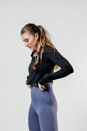 Black women's Terra Recovery Arc long sleeve crop top T-shirt by Hot Trend Vault, featuring a fitted design and stylish neckline.