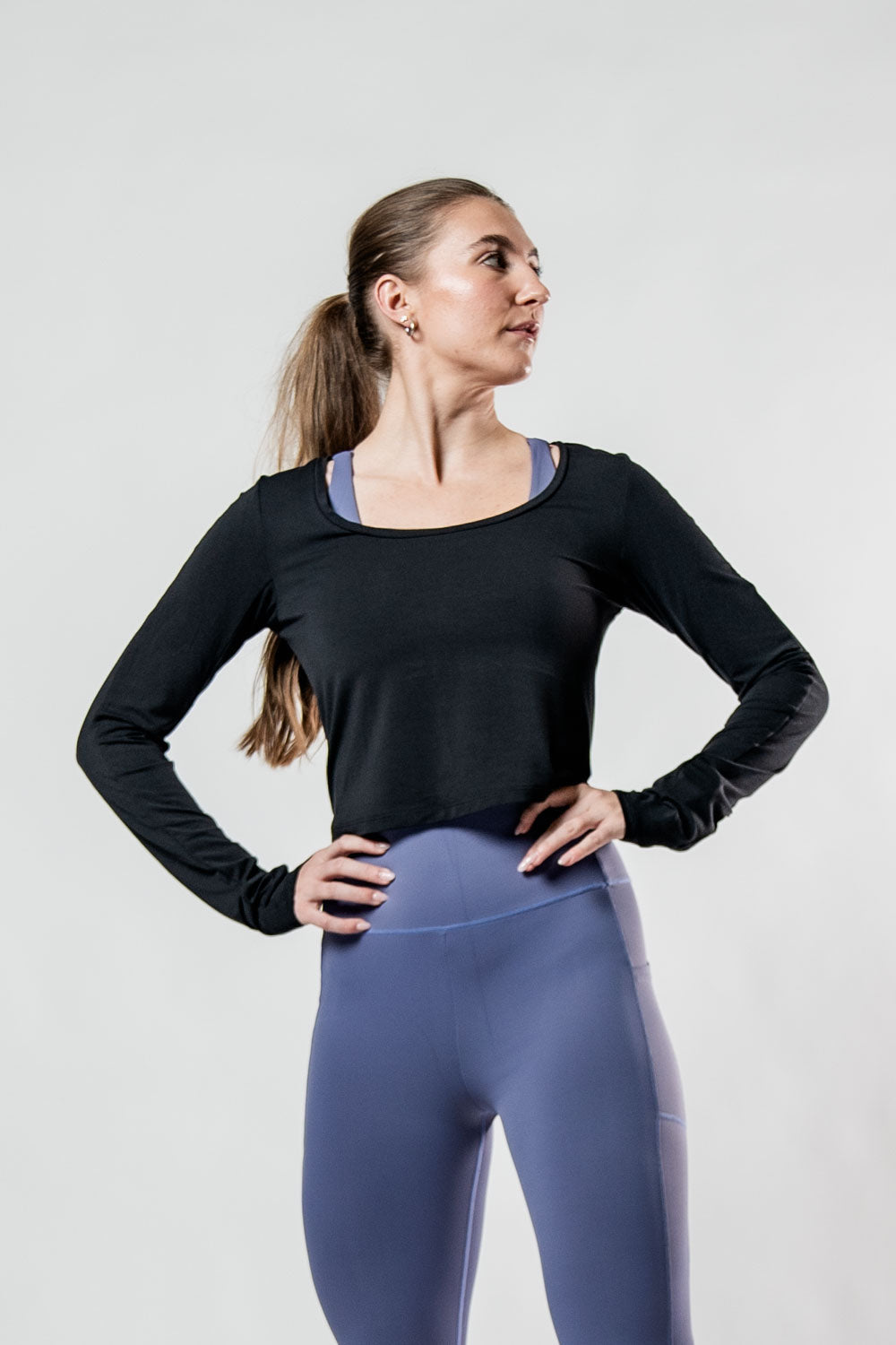 Black women's Terra Recovery Arc long sleeve crop top by Hot Trend Vault, featuring a fitted design and stylish crop length.