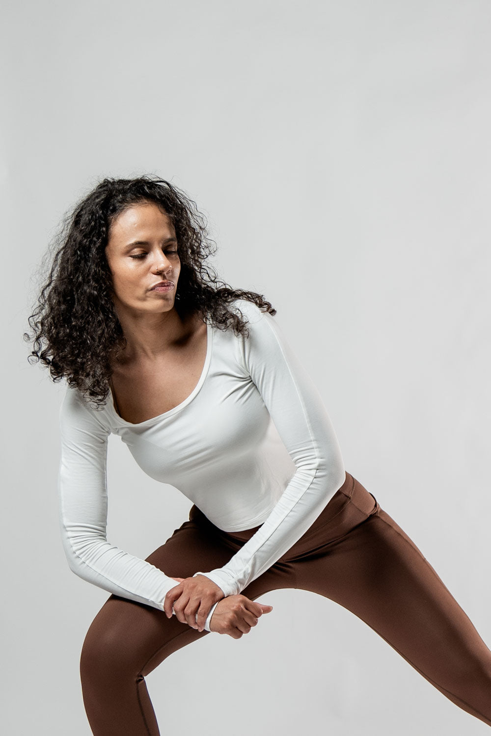 Women's white Terra Recovery Arc long sleeve crop T-shirt by Hot Trend Vault, soft fabric, fitted style, image shows front view.
