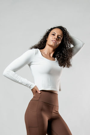 Women's Terra Recovery Arc long sleeve crop T-shirt in soft white from Hot Trend Vault, featuring a relaxed fit and stylish design.