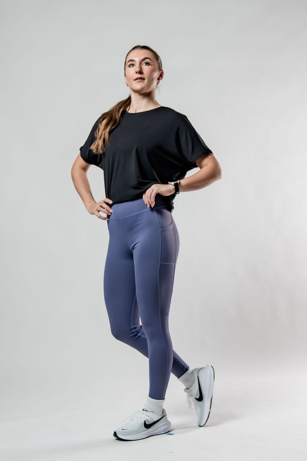 Women's black Terra Recovery Drift crop t-shirt by Hot Trend Vault, relaxed fit athleisure style, shown on a model.