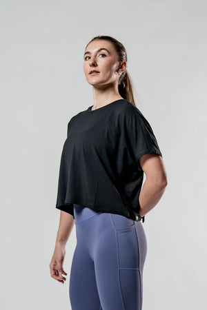 Black Women's Terra Recovery Drift Crop T-Shirt by Hot Trend Vault, relaxed fit, casual athleisure style, shown on a model.