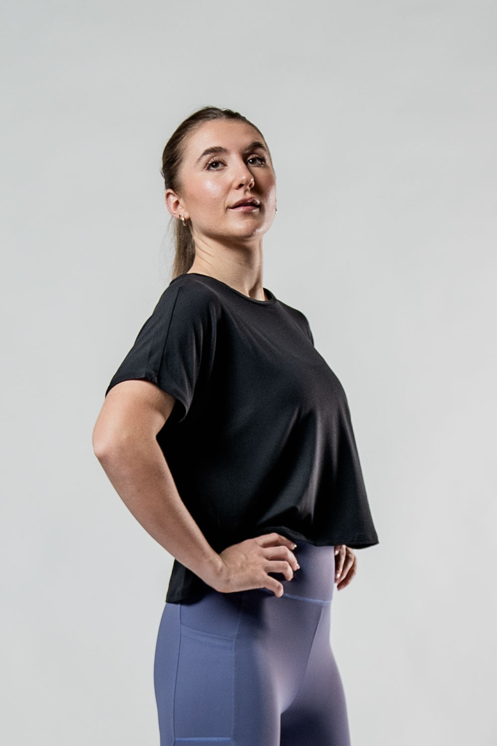 Black women's Terra Recovery Drift crop T-shirt by Hot Trend Vault, relaxed fit athleisure style, shown on model.