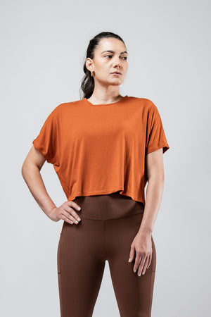 Women's Terra Recovery Drift Crop T-shirt in Sunfire Clay by Hot Trend Vault, featuring a relaxed silhouette and casual fit.