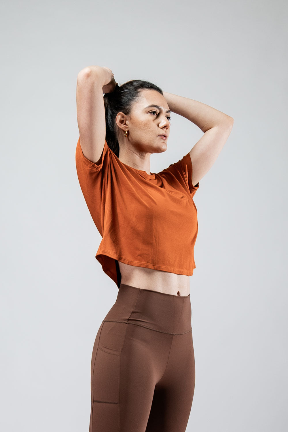 Women's Terra Recovery Drift Crop T-Shirt in Sunfire Clay with relaxed silhouette from Hot Trend Vault, featuring casual, comfortable fit.