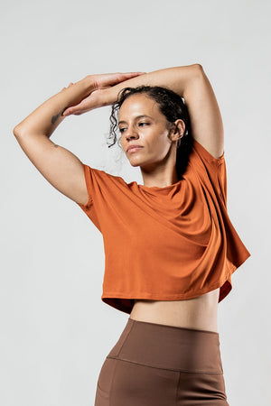 Women's Terra Recovery Drift Crop T-Shirt in Sunfire Clay by Hot Trend Vault, showing relaxed fit and casual style.