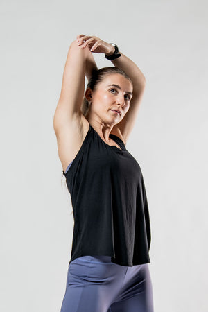 Women's black Terra Recovery Halo Tank top by Hot Trend Vault, a lightweight post-workout recovery tank for women.
