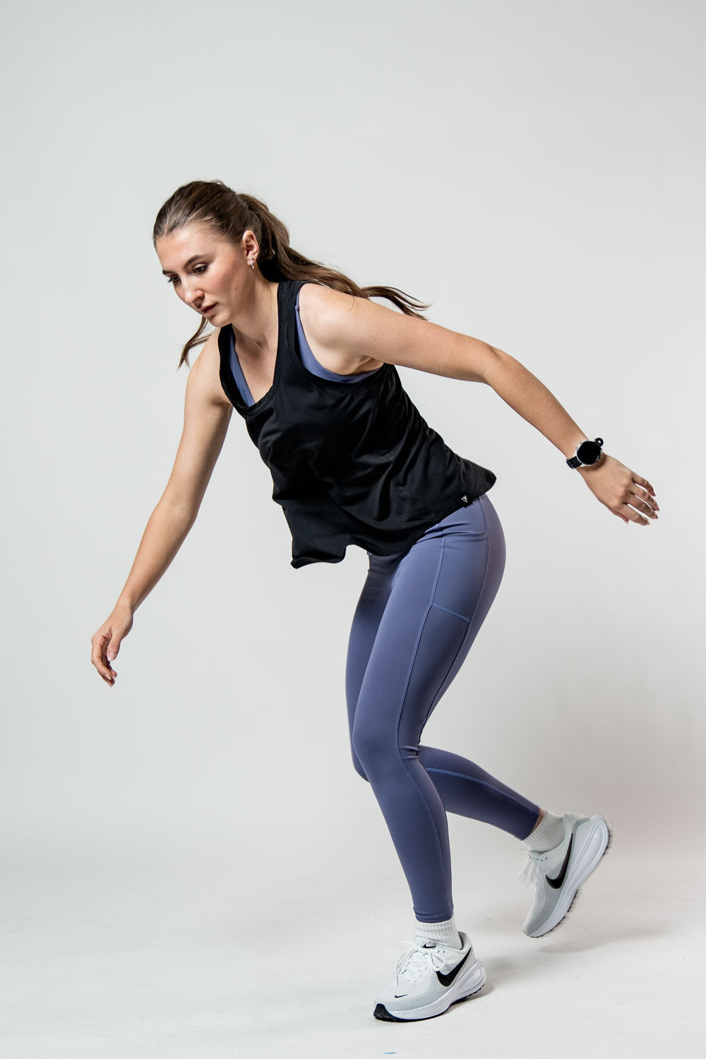 Women's black Terra Recovery Halo Tank top by Hot Trend Vault, designed for light post-workout recovery and casual wear.