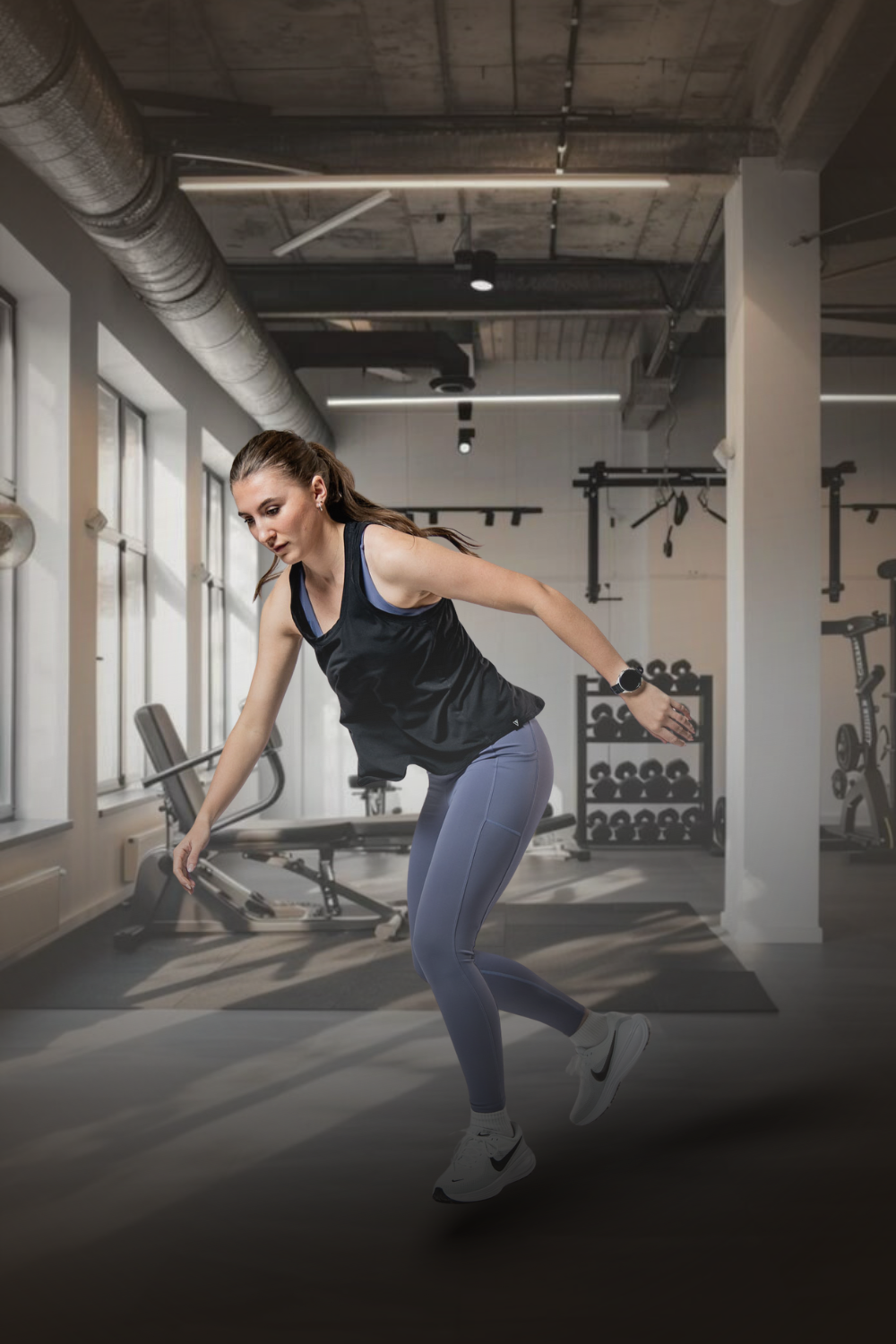 Black women's Terra Recovery Halo Tank top by Hot Trend Vault, designed for post-workout light recovery, shown on a model.