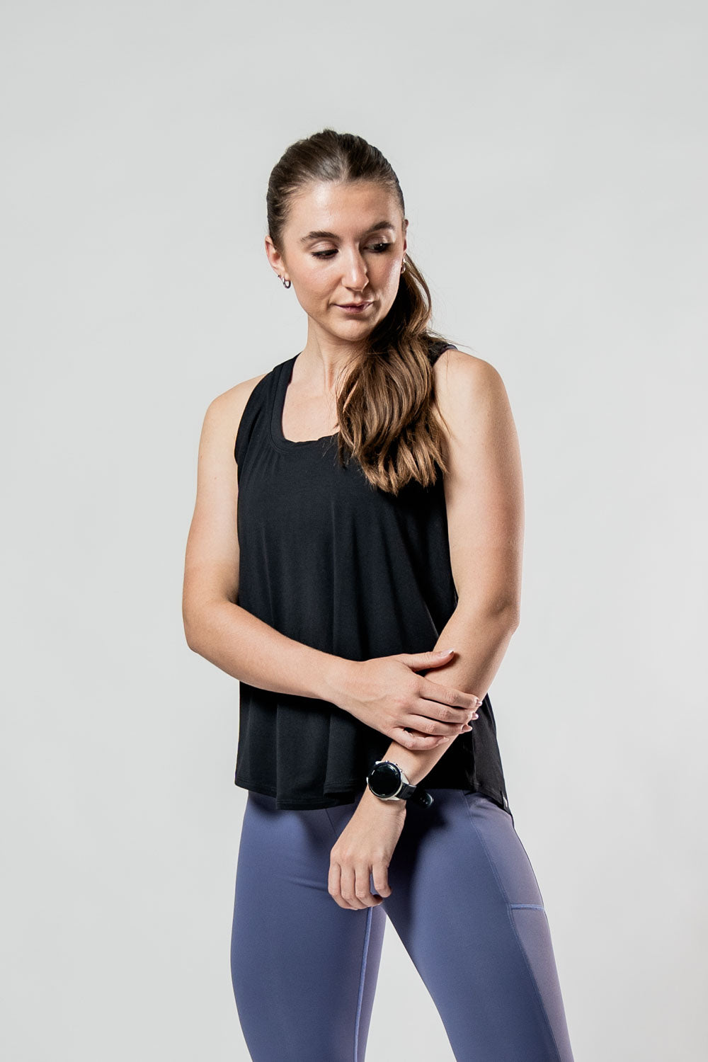 Women's black Terra Recovery Halo Tank top by Hot Trend Vault, lightweight post-workout recovery tank with a fitted design.