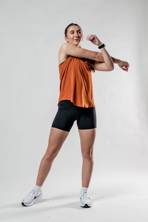 Women’s Terra Halo Recovery Tank Top in Sunfire Clay, breathable and lightweight tank top by Hot Trend Vault.