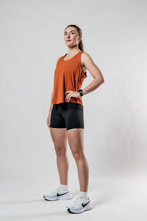 Women's Terra Halo Recovery Tank Top in Sunfire Clay by Hot Trend Vault, featuring breathable fabric and a relaxed fit.