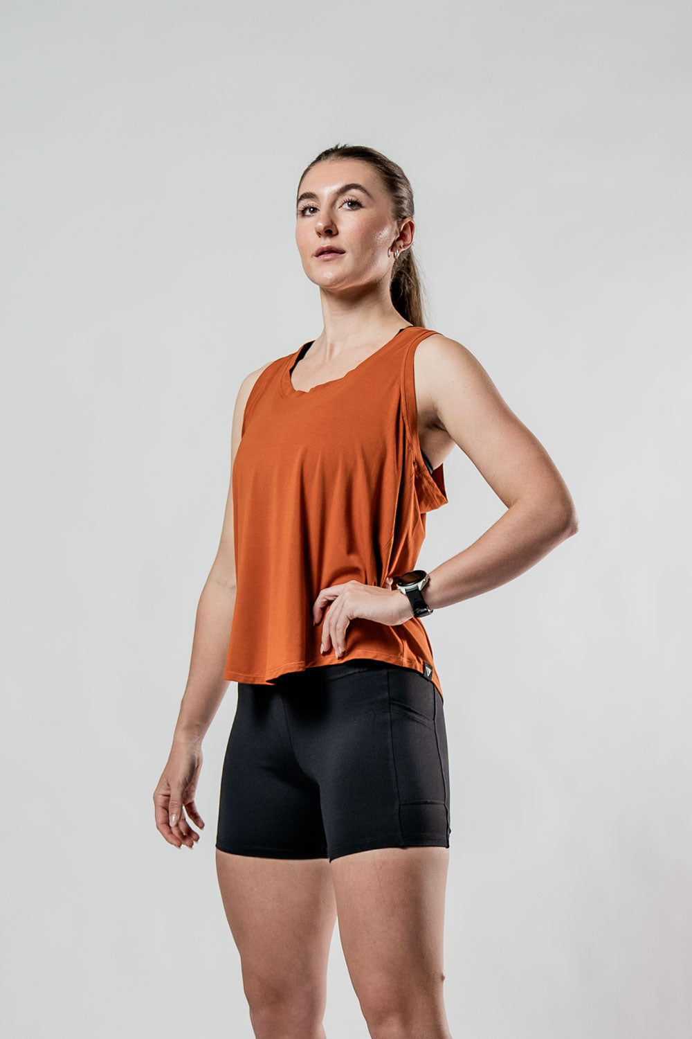 Women’s Terra Halo Recovery Tank Top in Sunfire Clay, breathable and lightweight, by Hot Trend Vault.