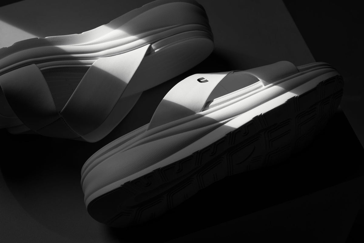 White matte Calto X1653 height increasing sandals with 2-inch lift from Hot Trend Vault, showcasing stylish and comfortable footwear.