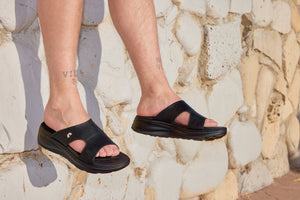 Black Calto X1655 height increasing sandals by Hot Trend Vault with 2-inch lift and grainy finish, designed for added height and style.