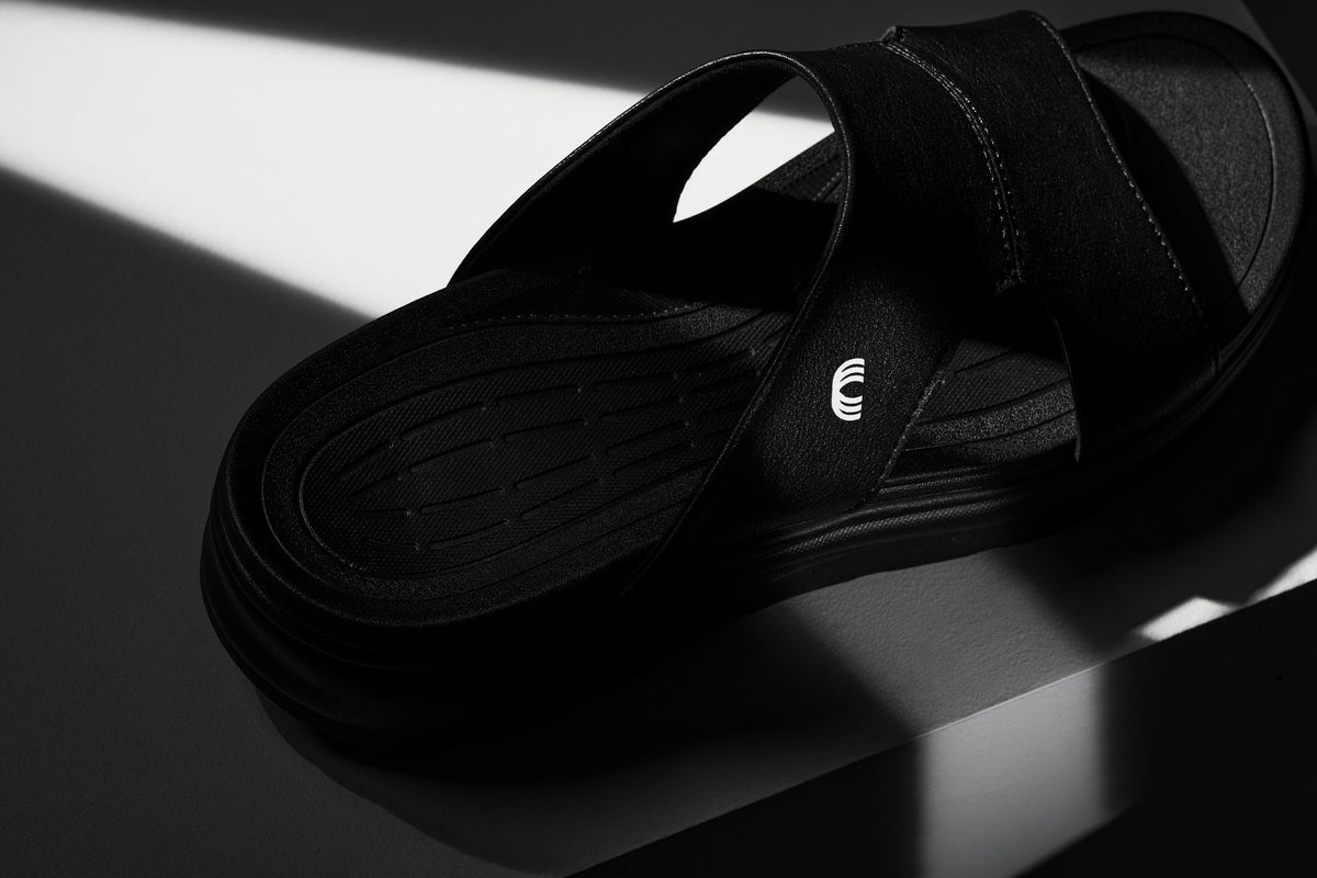 Black grainy Calto X1655 height increasing sandals by Hot Trend Vault, showing the stylish sandals with a 2-inch lift.