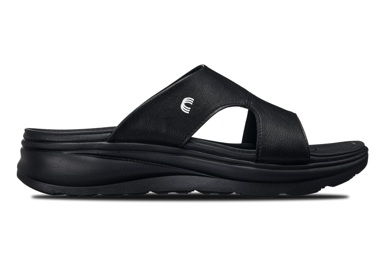 Black Calto X1655 height-increasing sandals by Hot Trend Vault with grainy finish and 2-inch lift for added height.