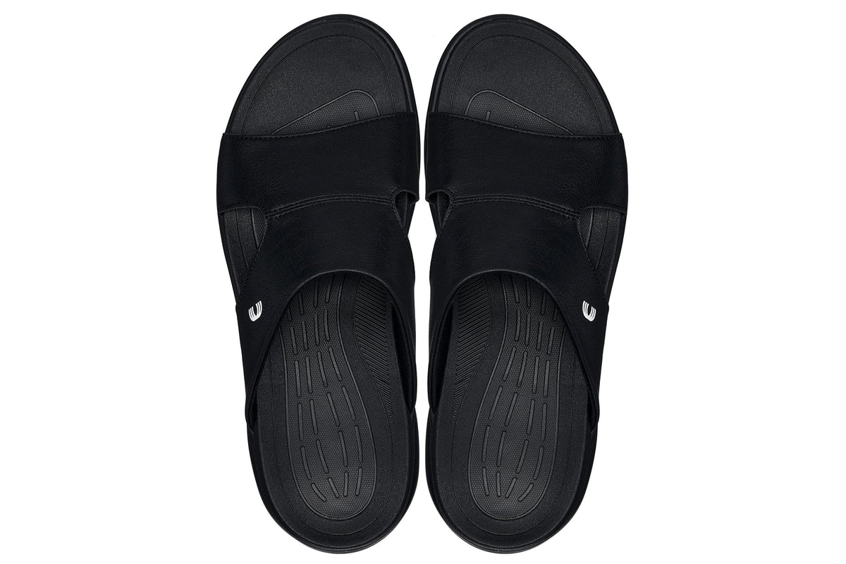 Black grainy Calto X1655 height increasing sandals by Hot Trend Vault with 2-inch lift and stylish design.