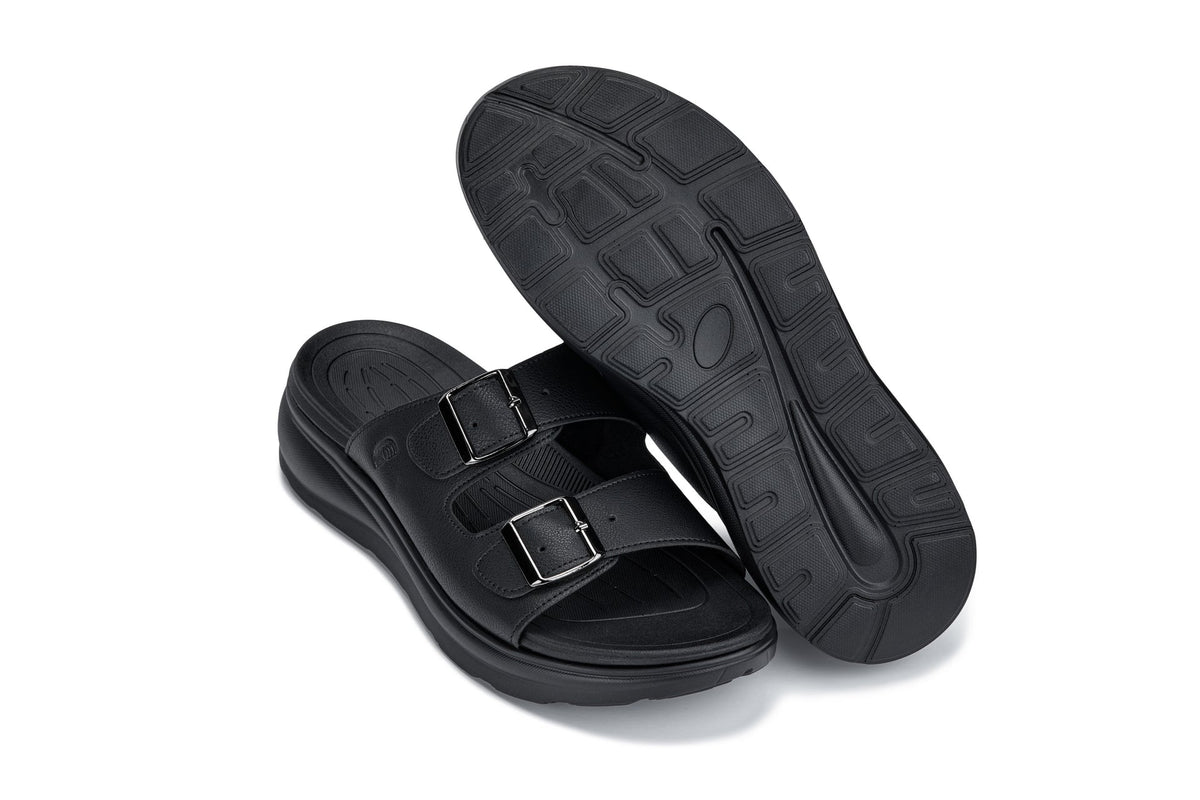 Black Calto X1660 sandals by Hot Trend Vault with dual buckles and 2 inches of added height, showcased on a neutral background.