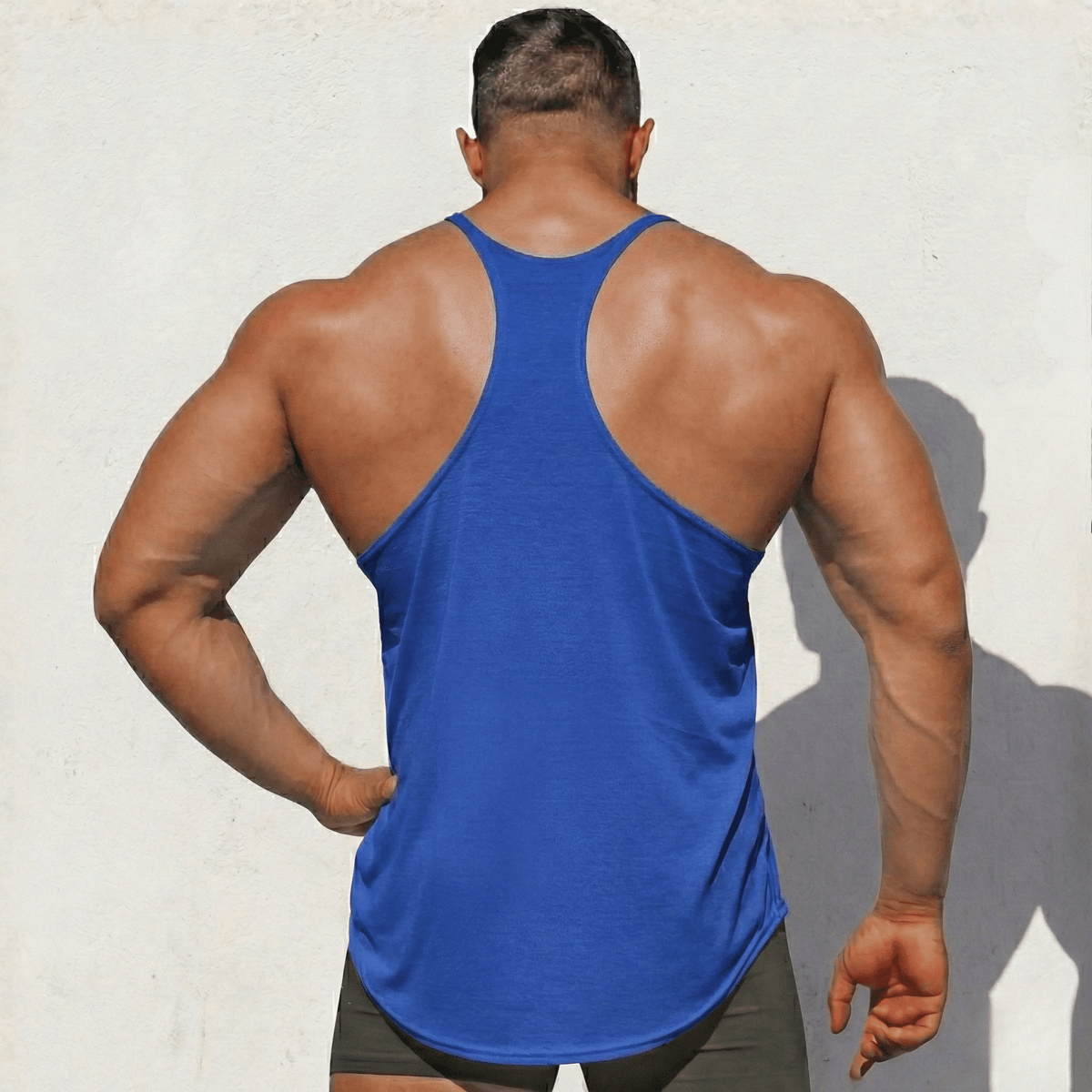 Hot Trend Vault original stringer tank top made in USA, featuring sleeveless design and athletic fit for gym or casual wear.