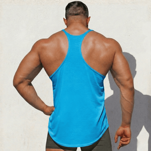 Hot Trend Vault original stringer tank top made in the USA, showcasing a fitted sleeveless athletic shirt with a logo detail.