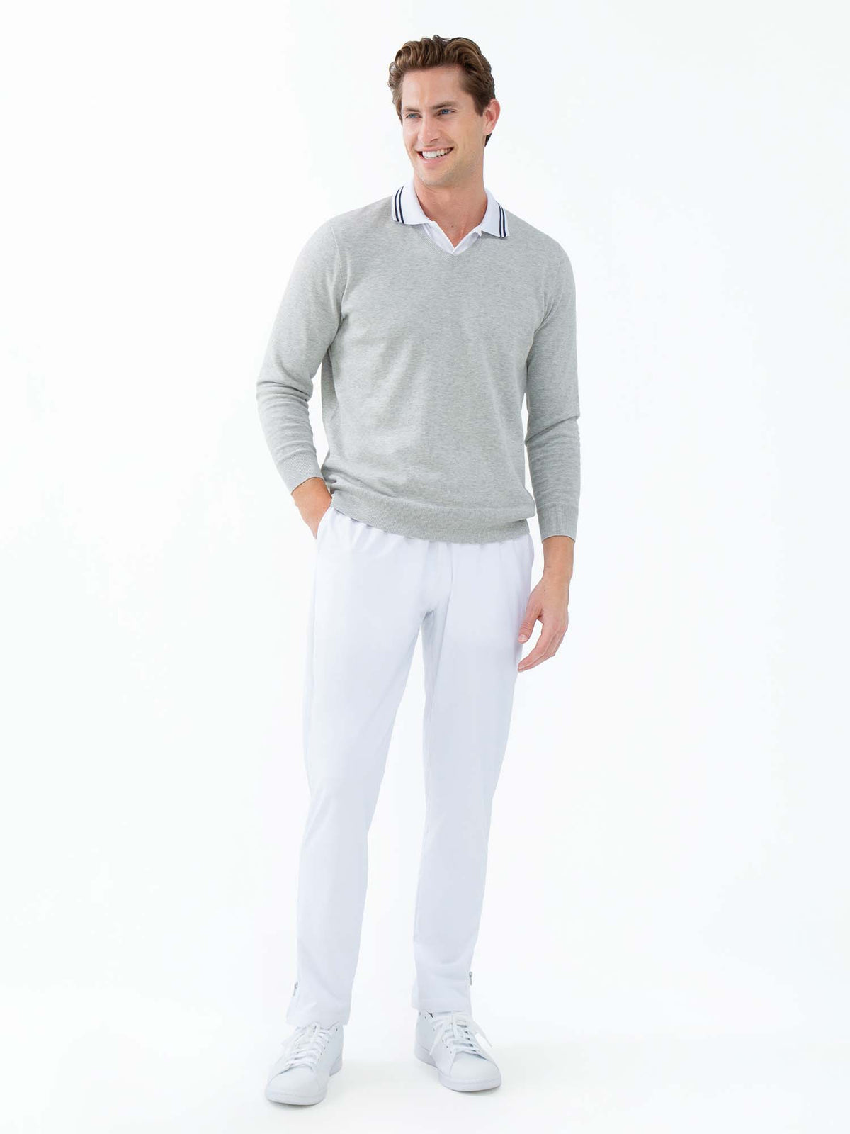 Men's white tennis pants by Hot Trend Vault, performance quick-dry fabric with zippered leg openings, ideal for active sports.