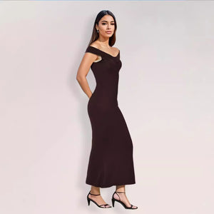 Black summer off-shoulder maxi dress by Hot Trend Vault featuring strapless, pleated, sleeveless design in polyester fabric.