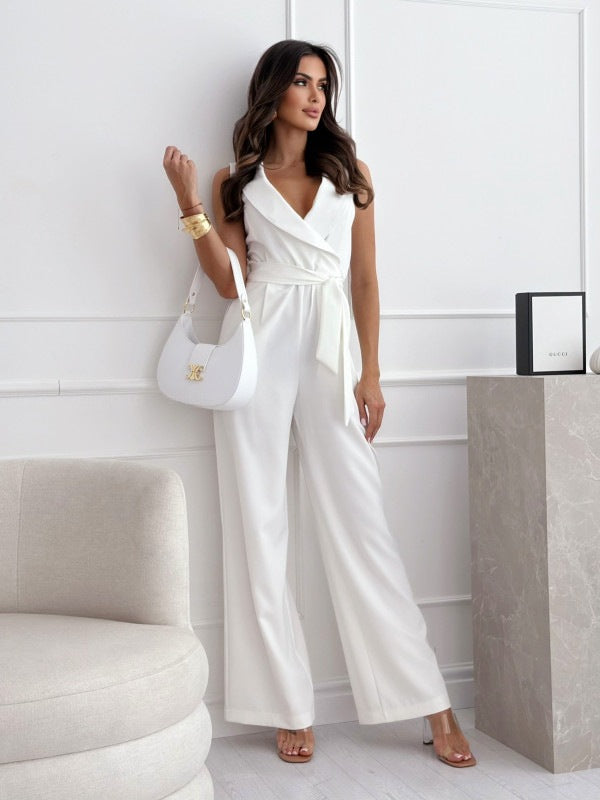 V-neck sleeveless jumpsuit with belt for women, stylish summer outfit by Hot Trend Vault, shown in a vibrant fabric.