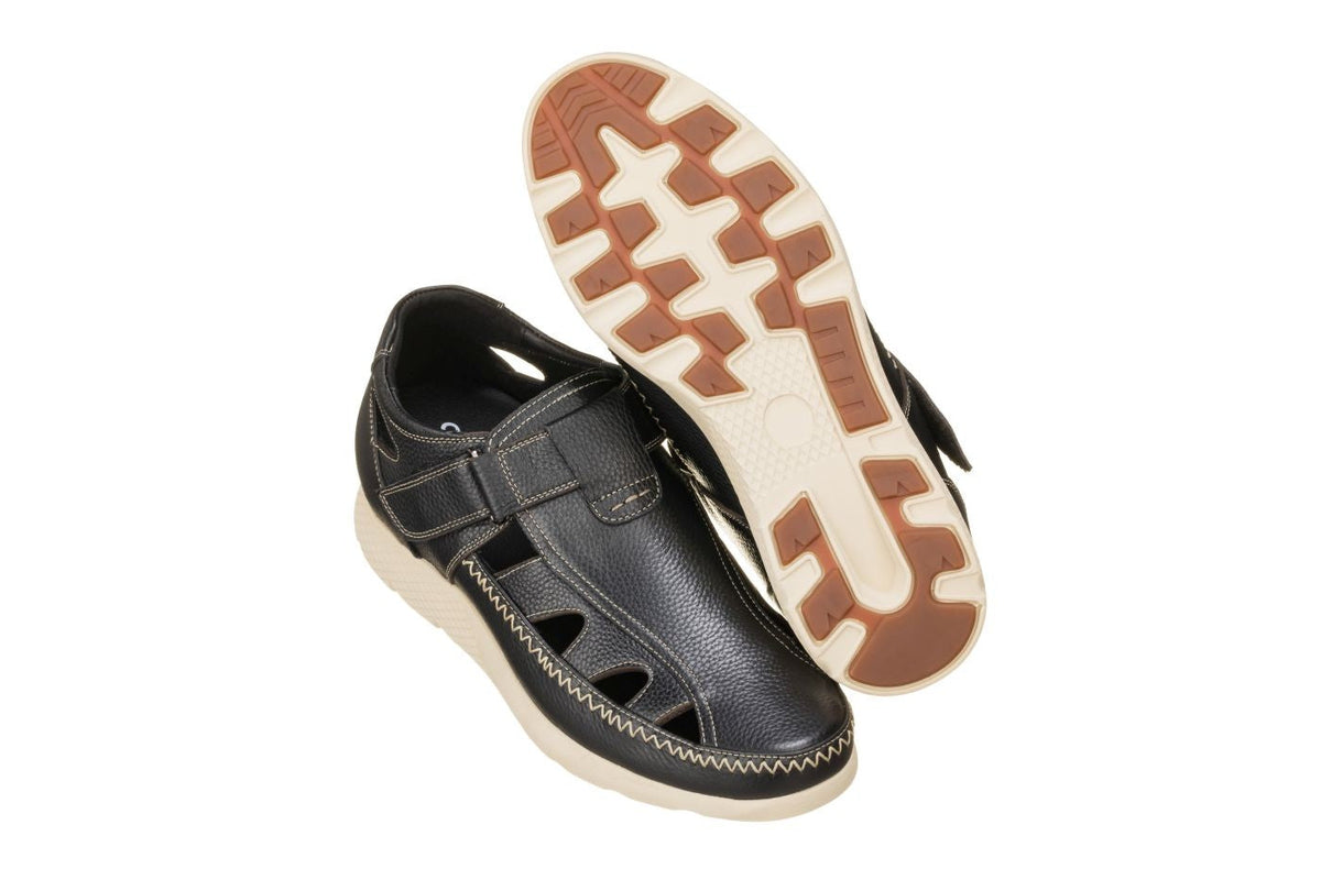 Black Calto K2132 fisherman sandals by Hot Trend Vault, lightweight with 2.8-inch height boost, shown from a side angle.