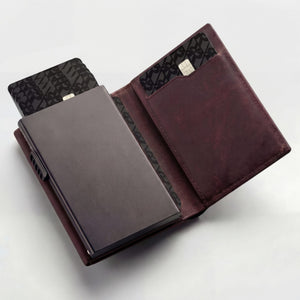 Full-grain vegetable tanned leather wallet with RFID blocking and popup card feature from Hot Trend Vault.