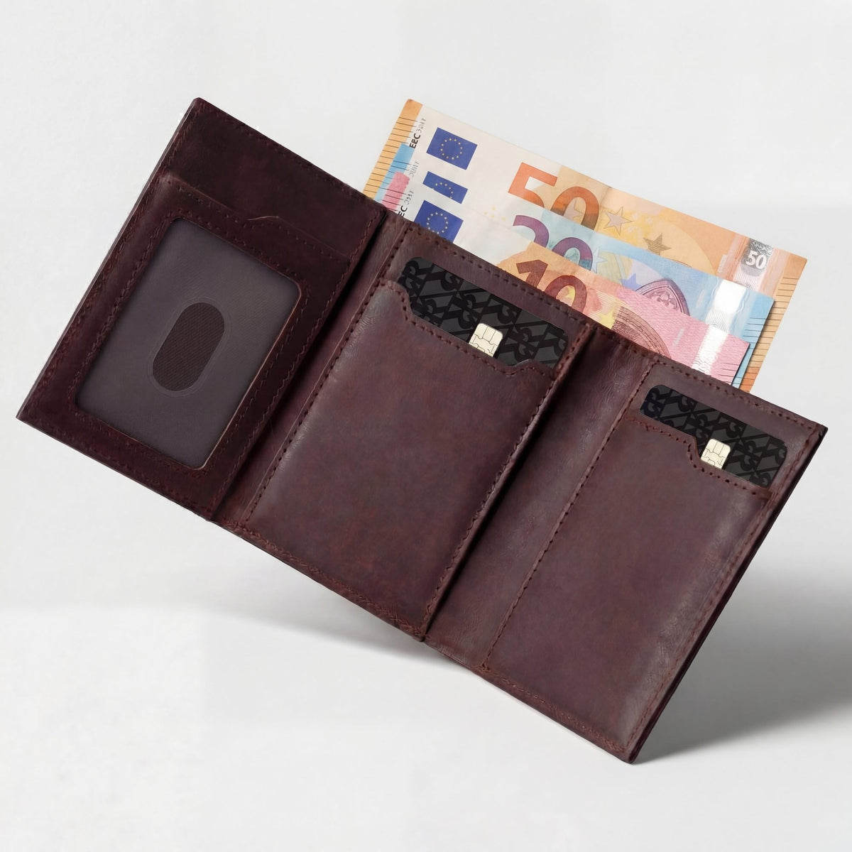Full-grain vegetable tanned leather wallet with RFID blocking and popup card feature by Hot Trend Vault.